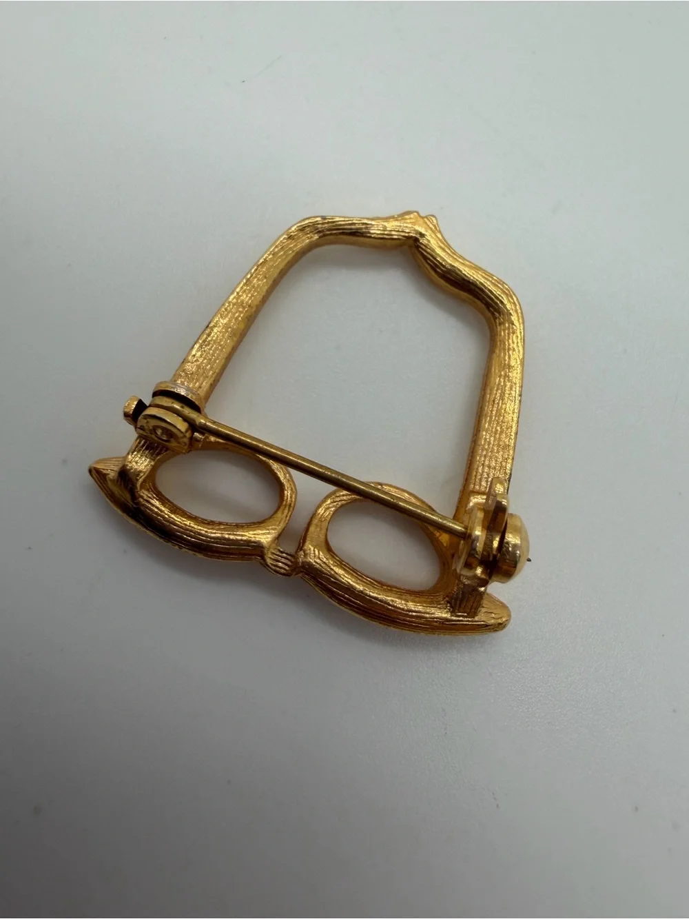 Gold tone glasses brooch